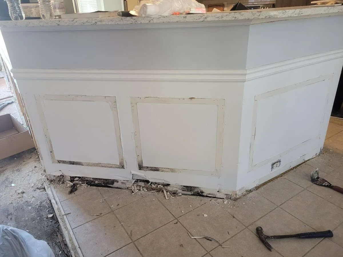 Water damage and mold on kitchen during Sewage Cleanup & Sanitation in Coral Gables